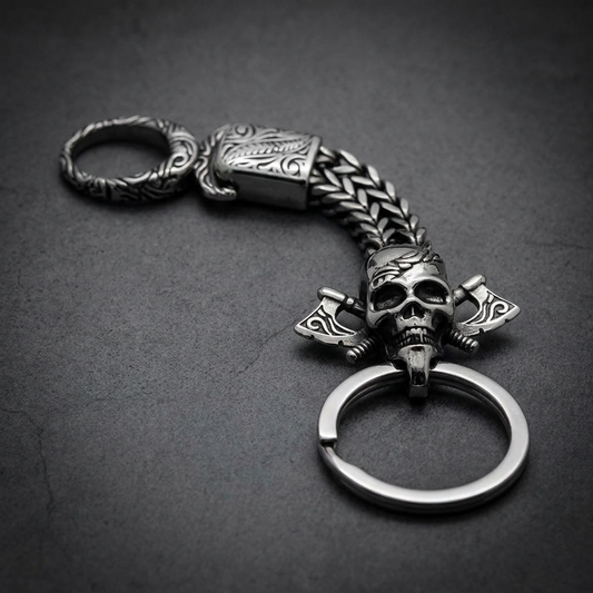 Imperial Skull Axe Keychain made of 316L stainless steel, featuring a prominent skull head flanked by two detailed axes.