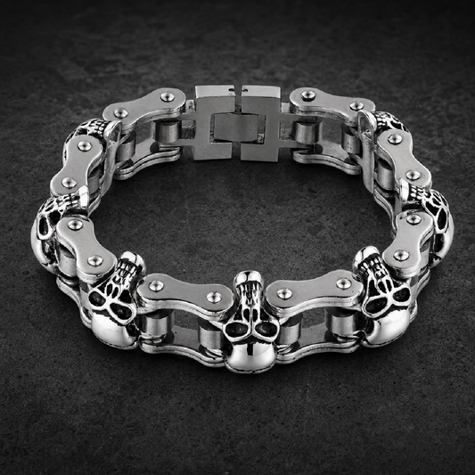 Silver polished 316L surgical stainless steel biker bracelet with skull motifs, motorcycle chain links, and secure Box / Slide clasp.
