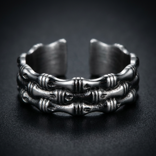Death Knuckle Bones 316L stainless steel ring on a human hand, showcasing the detailed skeletal knuckle design and solid metal construction.