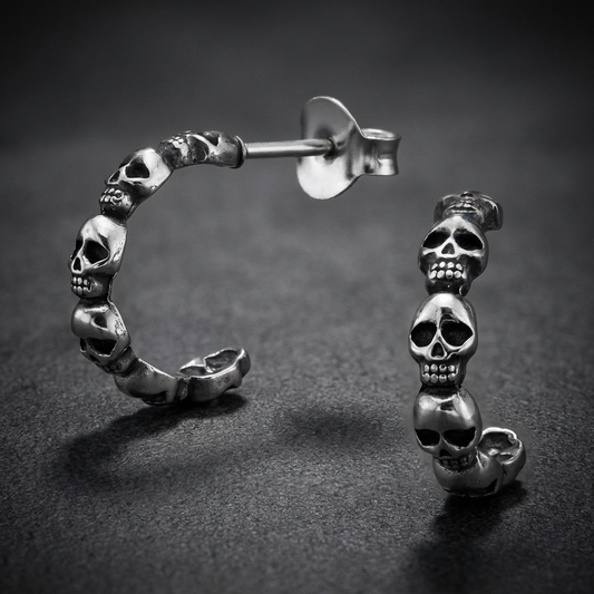 .925 sterling silver skull hoop earrings with intricate skull detailing on the entire hoop, showcasing a polished silver finish for SkullJewelry.com