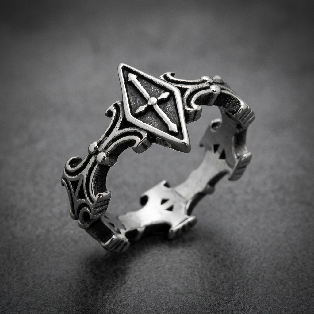 Sovereign Shield Unisex Ring, crafted from 316L stainless steel, featuring a central shield motif with a cross and ornate side scrollwork, dark oxidized finish.