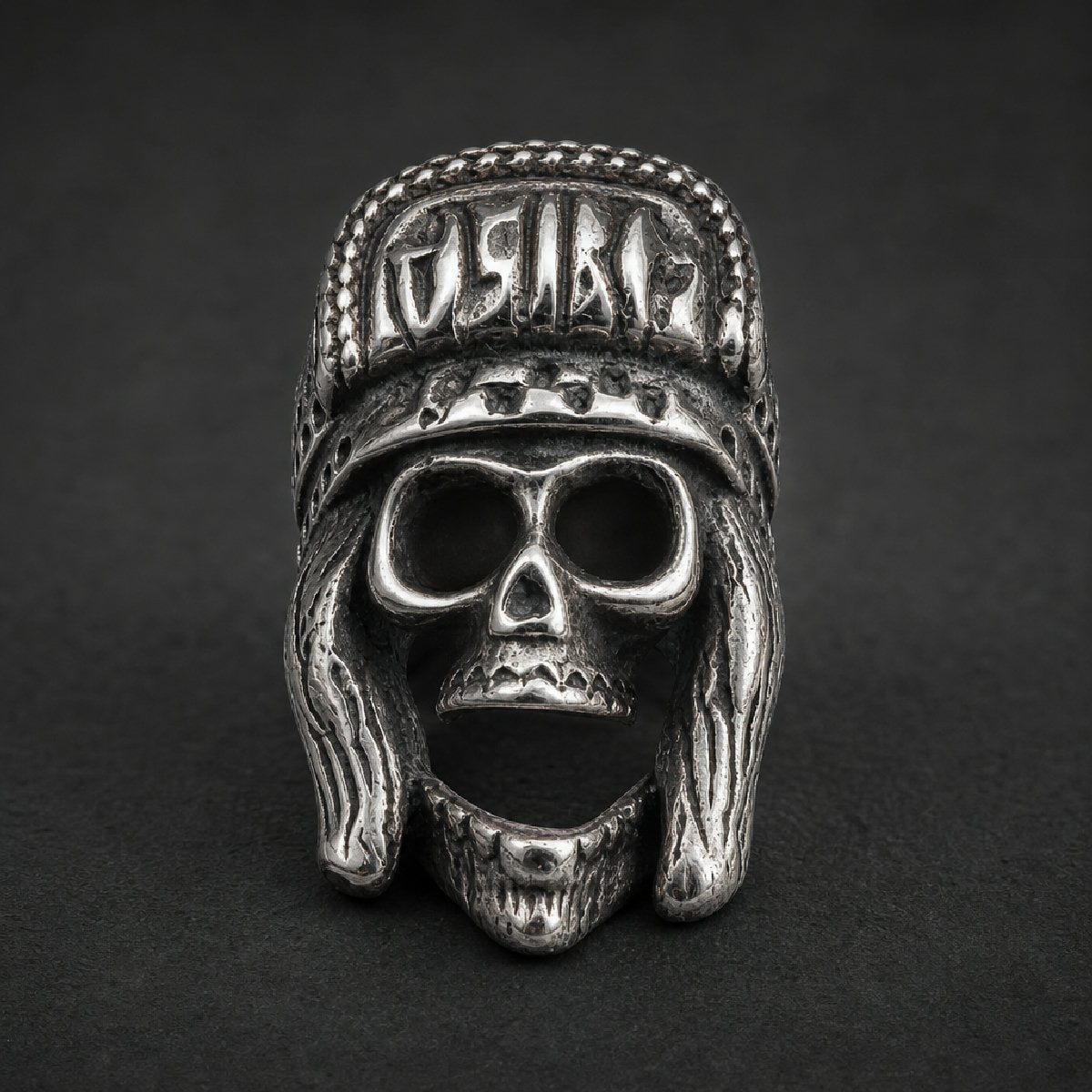Heavy 316L stainless steel skull ring with an ornate, tribal-style headdress, finished in natural bright silver with dark antique recesses.