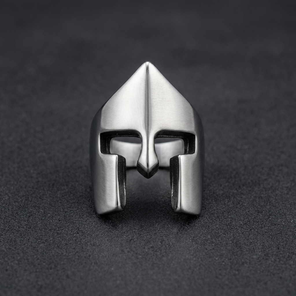 Close-up of the Valiant Sentinel Band, a 316L stainless steel ring featuring a polished Spartan helmet design with subtle, clean lines.