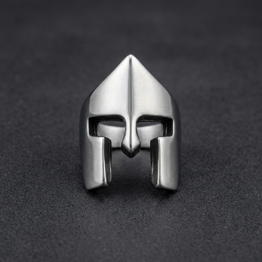 Close-up of the Valiant Sentinel Band, a 316L stainless steel ring featuring a polished Spartan helmet design with subtle, clean lines.