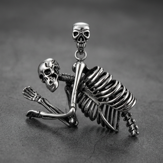 Stoic Skeleton Pendant 316L stainless steel, featuring a full skeletal figure with a grimacing skull and detailed ribcage, polished finish.