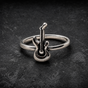 String Striker: The Ultimate Rockstar Accessory for Your Finger (#R0782)