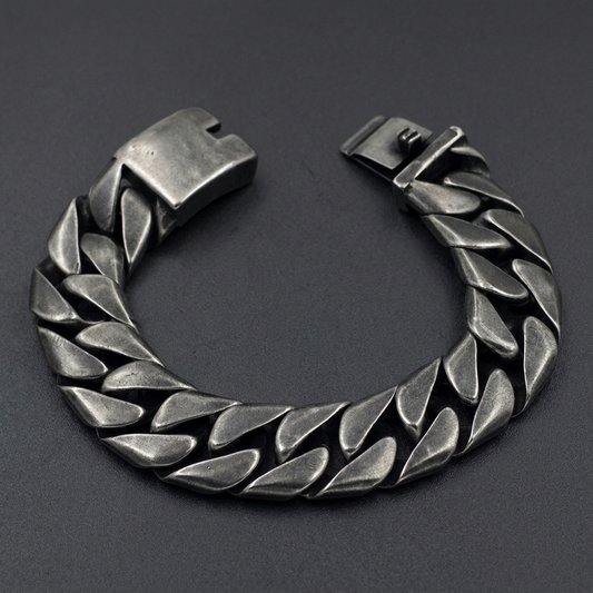 Heavy 316L surgical stainless steel curb link bracelet with an antiqued, dark silver finish and a robust clasp.