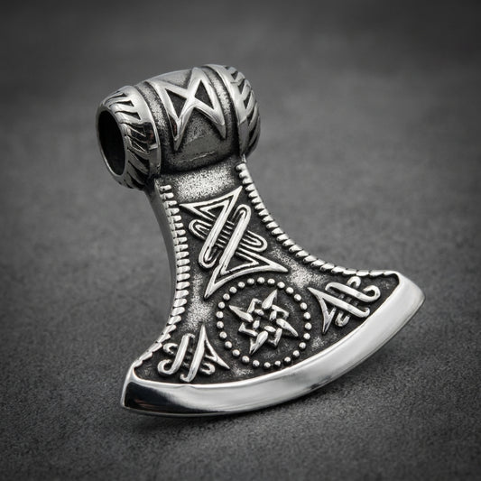 Heavy 316L stainless steel axe pendant with intricate Viking runes and symbols.